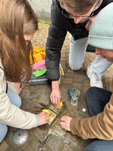 Canton students polishing Stolpersteine of the Zytnik children and their family in Bocholt, Germany in April 2024.